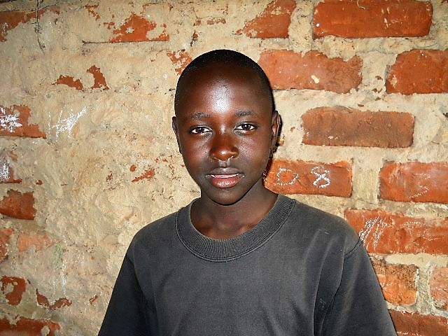 Livingstone Owaka. Now a Clinical manager and Triage Officer. Rescued together with his brother Mbaley. They are total orphans — before